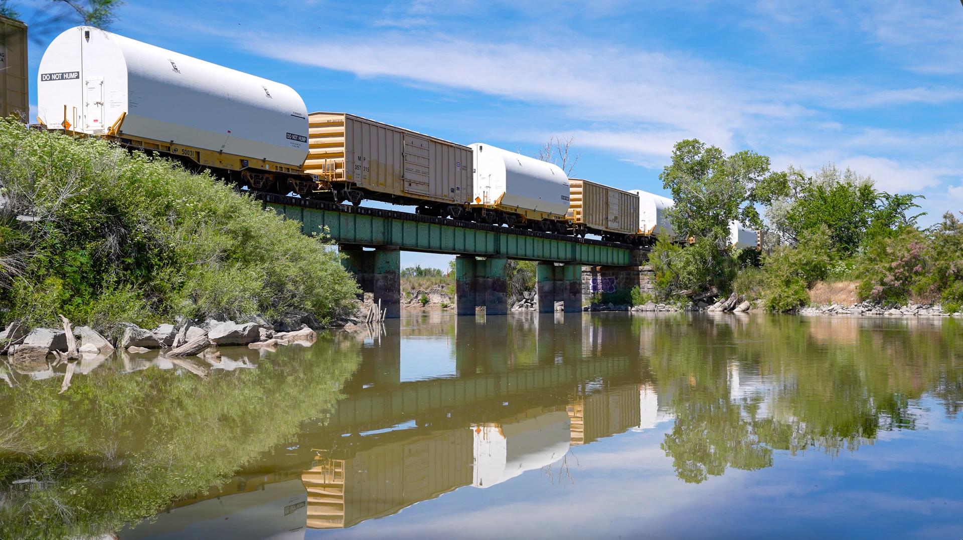 These images capture the final booster motor segments for NASA’s Artemis III mission departing Northrop Grumman’s Railyard Shipping Facility in Corinne, Utah, June 2. The eight segments will form the twin five-segment solid rocket boosters for the agency’s SLS (Space Launch System) rocket, providing more than 75% of the vehicle’s total thrust at liftoff.    Due to their immense size and weight, the booster segments are transported in specialized carriers and are being hauled by Union Pacific Railroad’s newest commemorative locomotive, No. 4547. Marking its inaugural mission, the locomotive will deliver the flight hardware to NASA’s Kennedy Space Center in Florida, where stacking operations for Artemis III are set to begin later this year. 